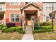 Inviting front entrance with stone accents, wood door, and lush landscaping at 4103 Mars Bay # 25, Acworth, GA 30101