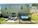Relaxing backyard with a hot tub and cozy seating area perfect for outdoor entertaining at 109 Red Fox Dr, Dallas, GA 30157