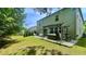 Spacious backyard with a hot tub and a patio, offering a relaxing outdoor retreat at 109 Red Fox Dr, Dallas, GA 30157