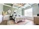 Comfortable bedroom with a decorative ceiling and elegant furnishings at 109 Red Fox Dr, Dallas, GA 30157