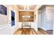 Welcoming foyer with wood accents, a bench, and modern decor at 109 Red Fox Dr, Dallas, GA 30157