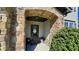 Charming front entryway with stone archway and inviting door at 109 Red Fox Dr, Dallas, GA 30157