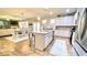 Open-concept living space with kitchen, dining, and living areas and an island with seating at 109 Red Fox Dr, Dallas, GA 30157