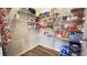Walk-in pantry with lots of shelving space for food and storage containers at 109 Red Fox Dr, Dallas, GA 30157