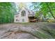 Beautiful exterior of the home with a deck and large backyard at 1336 Amberwood Dr, Woodstock, GA 30189