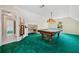 Upstairs game room with pool table, recessed lights and vaulted ceilings at 1336 Amberwood Dr, Woodstock, GA 30189