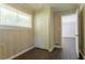 Bedroom features hardwood floors, a double closet and a window for natural lighting at 2311 Cherry Blossom Sw Dr, Atlanta, GA 30331