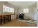 Kitchen featuring damage to the lower walls and an older appliance at 2311 Cherry Blossom Sw Dr, Atlanta, GA 30331