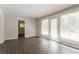 Living room with hardwood floors, neutral walls, and access to other rooms at 2311 Cherry Blossom Sw Dr, Atlanta, GA 30331