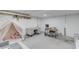 Spacious finished basement with a play tent and office area at 3095 Willow Park Dr, Dacula, GA 30019