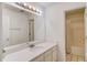 Bright bathroom with a large mirror, quartz countertops, and easy access to a tub and shower at 3095 Willow Park Dr, Dacula, GA 30019