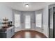 Sun-filled breakfast nook with bright walls and a door to the backyard at 3095 Willow Park Dr, Dacula, GA 30019