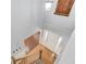 Welcoming foyer with hardwood floors and staircase, illuminated by natural light and a stylish light fixture at 3095 Willow Park Dr, Dacula, GA 30019