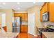 Spacious kitchen featuring granite countertops, stainless steel appliances, and ample cabinet space at 450 Hammersmith Dr, Suwanee, GA 30024