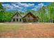 Attractive craftsman style home with a welcoming front porch and lush greenery, in a well-maintained neighborhood at 60 Browning Shoals Rd, Social Circle, GA 30025