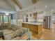 Bright kitchen with a large island, stainless steel appliances, and wood accents at 60 Browning Shoals Rd, Social Circle, GA 30025