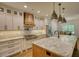 Spacious kitchen with a large island, stainless steel appliances, and ample cabinet space at 60 Browning Shoals Rd, Social Circle, GA 30025