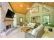 Outdoor living room features a brick fireplace and views of nature at 60 Browning Shoals Rd, Social Circle, GA 30025