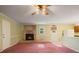 Inviting living room featuring a brick fireplace, soft lighting, and classic finishes at 723 Monticello Se Way, Marietta, GA 30067