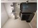 Efficient laundry room with modern appliances and shelving for organized storage at 1132 Red Bud Cir, Villa Rica, GA 30180