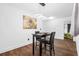 Bright dining area with modern lighting and minimalist decor offers a clean, contemporary look at 1554 Cardinal Rd, Jonesboro, GA 30238