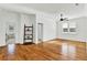 Bright bedroom with hardwood floors, ceiling fan, and large windows with plantation shutters at 2201 Old Dallas Sw Rd, Marietta, GA 30064
