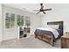 Cozy bedroom with a ceiling fan, window views, and comfortable furnishings at 2201 Old Dallas Sw Rd, Marietta, GA 30064