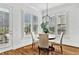Bright breakfast nook with shuttered windows and hardwood floors at 2201 Old Dallas Sw Rd, Marietta, GA 30064