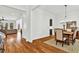 Elegant dining room with hardwood floors, a stylish light fixture, and ample seating at 2201 Old Dallas Sw Rd, Marietta, GA 30064