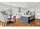 Bright open-concept kitchen with stainless appliances, an island, and adjacent breakfast nook at 2201 Old Dallas Sw Rd, Marietta, GA 30064