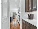 Hallway view of kitchen featuring modern appliances and white countertops at 2201 Old Dallas Sw Rd, Marietta, GA 30064