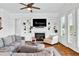 Comfortable living room features fireplace and built-in shelving at 2201 Old Dallas Sw Rd, Marietta, GA 30064