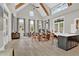 Bright lounge area with dining table, vaulted ceilings, and a modern kitchenette at 2201 Old Dallas Sw Rd, Marietta, GA 30064