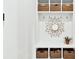 Mudroom offers built-in storage with baskets and hooks for organization at 2201 Old Dallas Sw Rd, Marietta, GA 30064