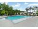 Community pool and deck surrounded by lounge chairs and mature landscaping at 2201 Old Dallas Sw Rd, Marietta, GA 30064