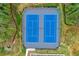 Aerial view of tennis courts with blue playing surface and black metal fencing at 2201 Old Dallas Sw Rd, Marietta, GA 30064