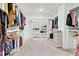 Spacious walk-in closet with custom shelving and ample storage space for clothes and accessories at 2201 Old Dallas Sw Rd, Marietta, GA 30064