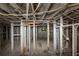 Unfinished basement featuring exposed beams and structural elements, ready for customization and finishing at 2952 Mcafee Rd, Decatur, GA 30032