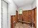 Bathroom features wood paneling and natural light from a window at 2952 Mcafee Rd, Decatur, GA 30032