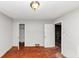 Spacious bedroom with hardwood floors, closet and white trim at 2952 Mcafee Rd, Decatur, GA 30032