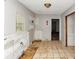 Spacious kitchen featuring tile floors and natural light at 2952 Mcafee Rd, Decatur, GA 30032