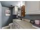Cozy bathroom with stylish white cabinets, countertop, and modern fixtures at 3460 Wycherly Ne Ct, Brookhaven, GA 30319