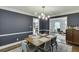 Well-lit dining room connecting to the kitchen and living room, perfect for entertaining at 3460 Wycherly Ne Ct, Brookhaven, GA 30319