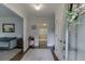 Welcoming foyer with hardwood floors, light blue walls and decorative rug at 3460 Wycherly Ne Ct, Brookhaven, GA 30319