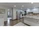 Spacious kitchen with stainless steel appliances, granite counters, hardwood floors and ample storage at 3460 Wycherly Ne Ct, Brookhaven, GA 30319