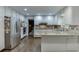 Modern kitchen with stainless steel appliances, granite countertops and hardwood flooring at 3460 Wycherly Ne Ct, Brookhaven, GA 30319