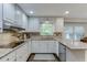 Charming kitchen featuring granite countertops, stainless steel appliances, and hardwood floors at 3460 Wycherly Ne Ct, Brookhaven, GA 30319