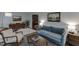 Bright living room with floor to ceiling windows, neutral walls and modern decor at 3460 Wycherly Ne Ct, Brookhaven, GA 30319
