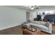 Cozy living room featuring hardwood floors, sectional sofa, and view of kitchen at 3460 Wycherly Ne Ct, Brookhaven, GA 30319