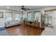 Living room featuring a hardwood floor, large windows and comfortable seating at 3460 Wycherly Ne Ct, Brookhaven, GA 30319
